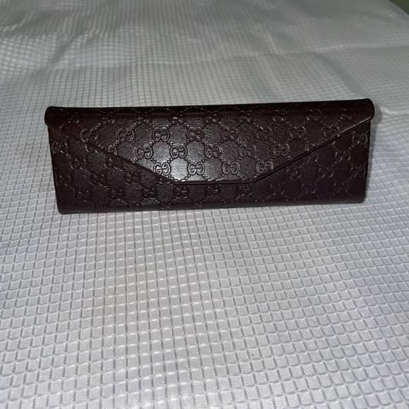 brown leather monogrammed foldable eyeglasses case from Gucci. - Picture 3 of 16